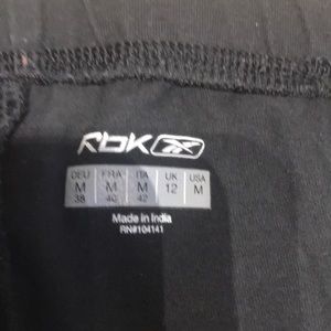 Reebok black tights, size M.